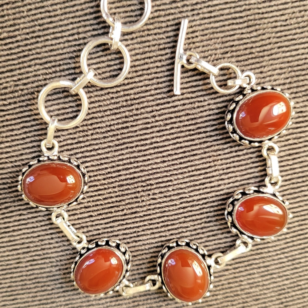 Elegant Silver and Red Stone Bracelet